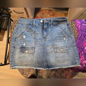 Denim mini skirt by So. Raw hem, distressing,front patch pockets. 11/30. New